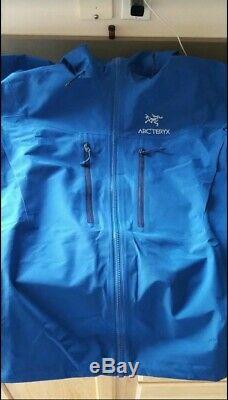 $ 425 Arc'teryx Alpha Sv Mens Gore-tex Pro Jacket Bleu Taille Moyenne, Utilisé