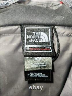 La veste manteau grise isolée à capuche pour homme de la série Summit de The North Face en Hyvent Alpha.