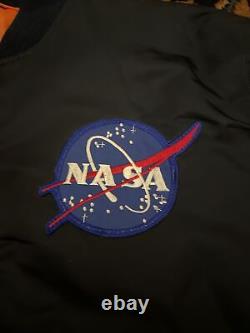 Veste de bombardier officielle de la 100ème mission spatiale de la NASA d'ALPHA Industries, taille M
